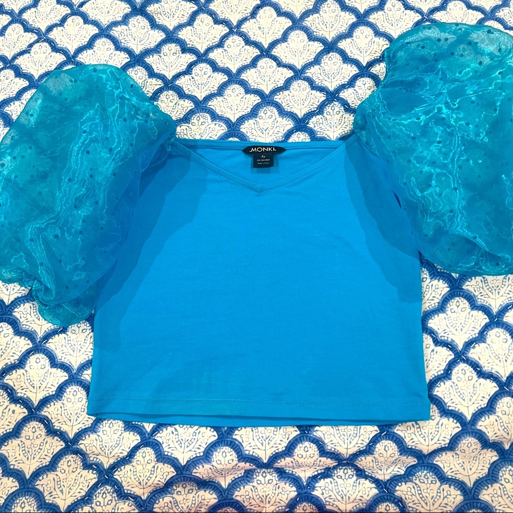 Teal puff sleeve top. Pants Store. Perf for rush or game day.